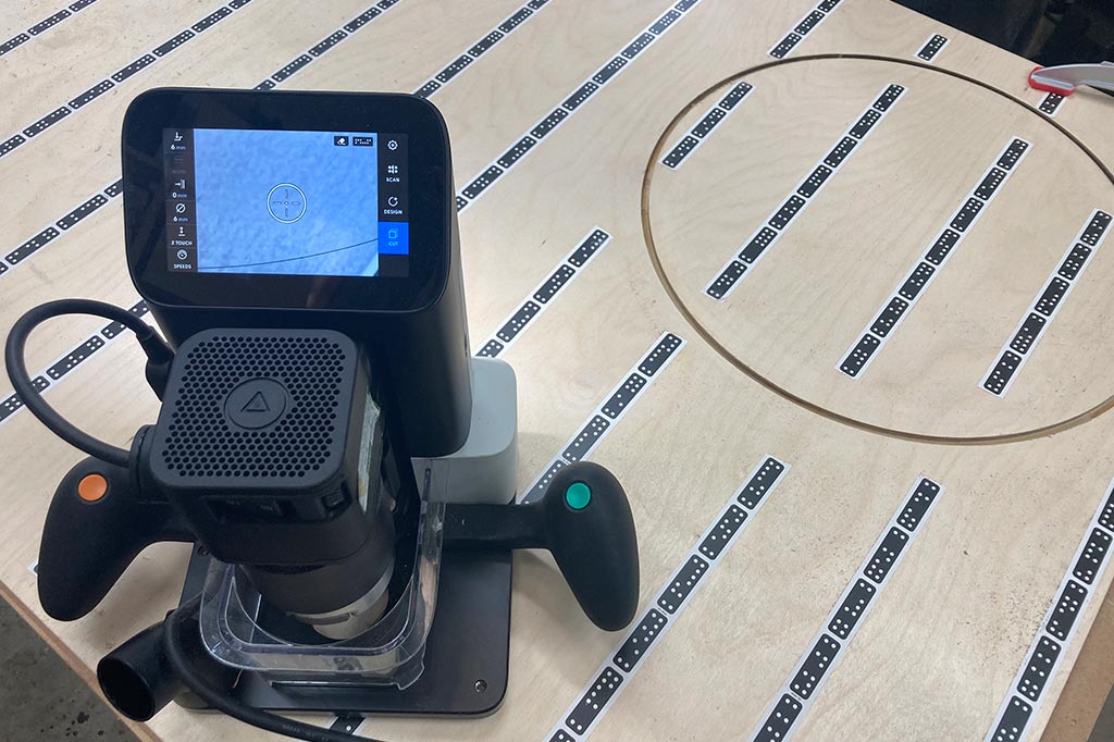 Steam bending course: A shaper tool on a workbench