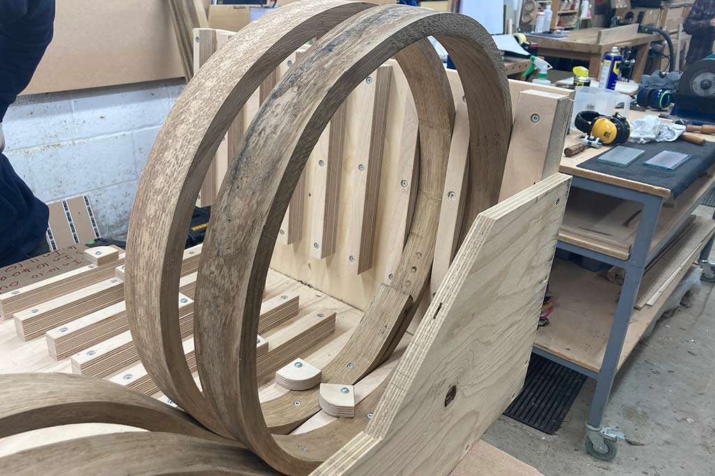 Steam bending course: Steam bent timber in the drying rack
